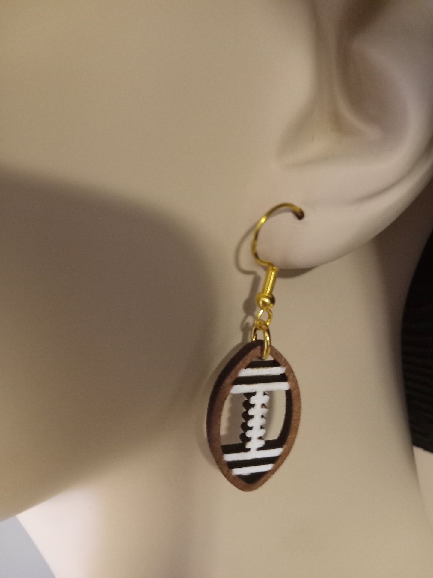 Football dangle earrings